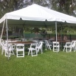 wedding tent with tables and chairs