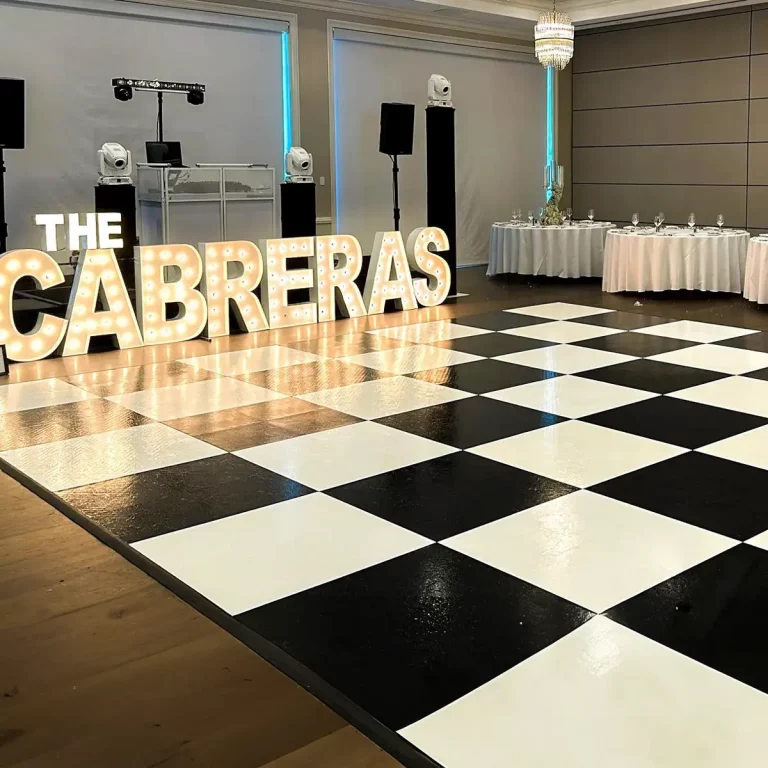 black and white checkered portable tile dance floor